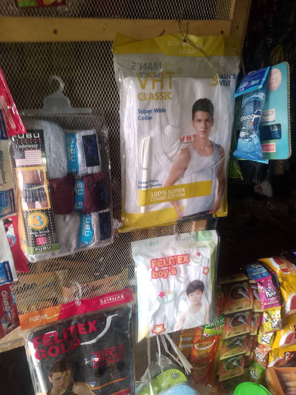 Provisions, perfumes, toys singlet